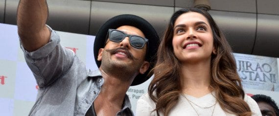 MUMBAI,INDIA SEPTEMBER 15: Ranveer Singh and Deepika Padukone at the launch from their upcoming move Bajirao Mastani in Mumbai.(Photo by Milind Shelte/India Today Group/Getty Images)